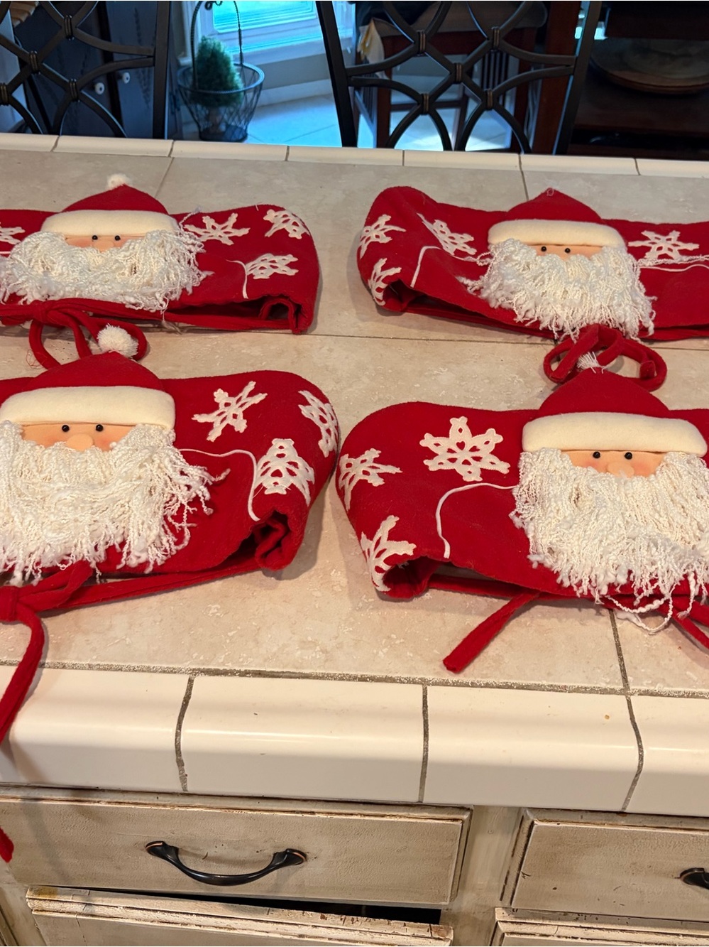 Set of 4 Red Santa Chair Back Covers with Snowflake Design